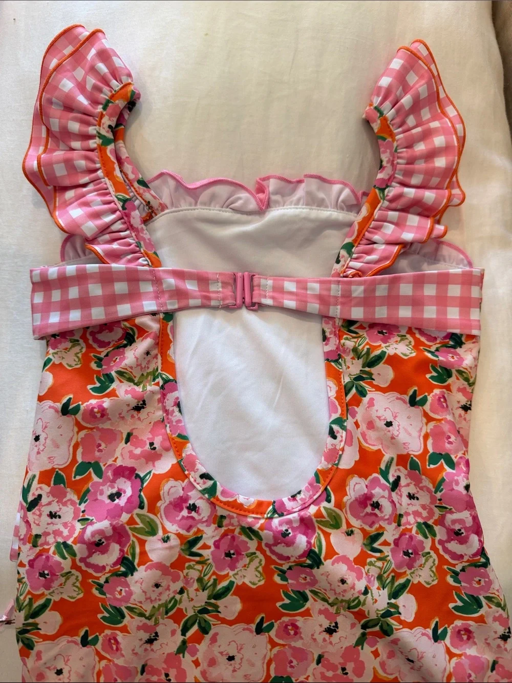 SweetHoney Pink Floral Swim Suit with Orange Background